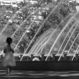 Girl in front of water